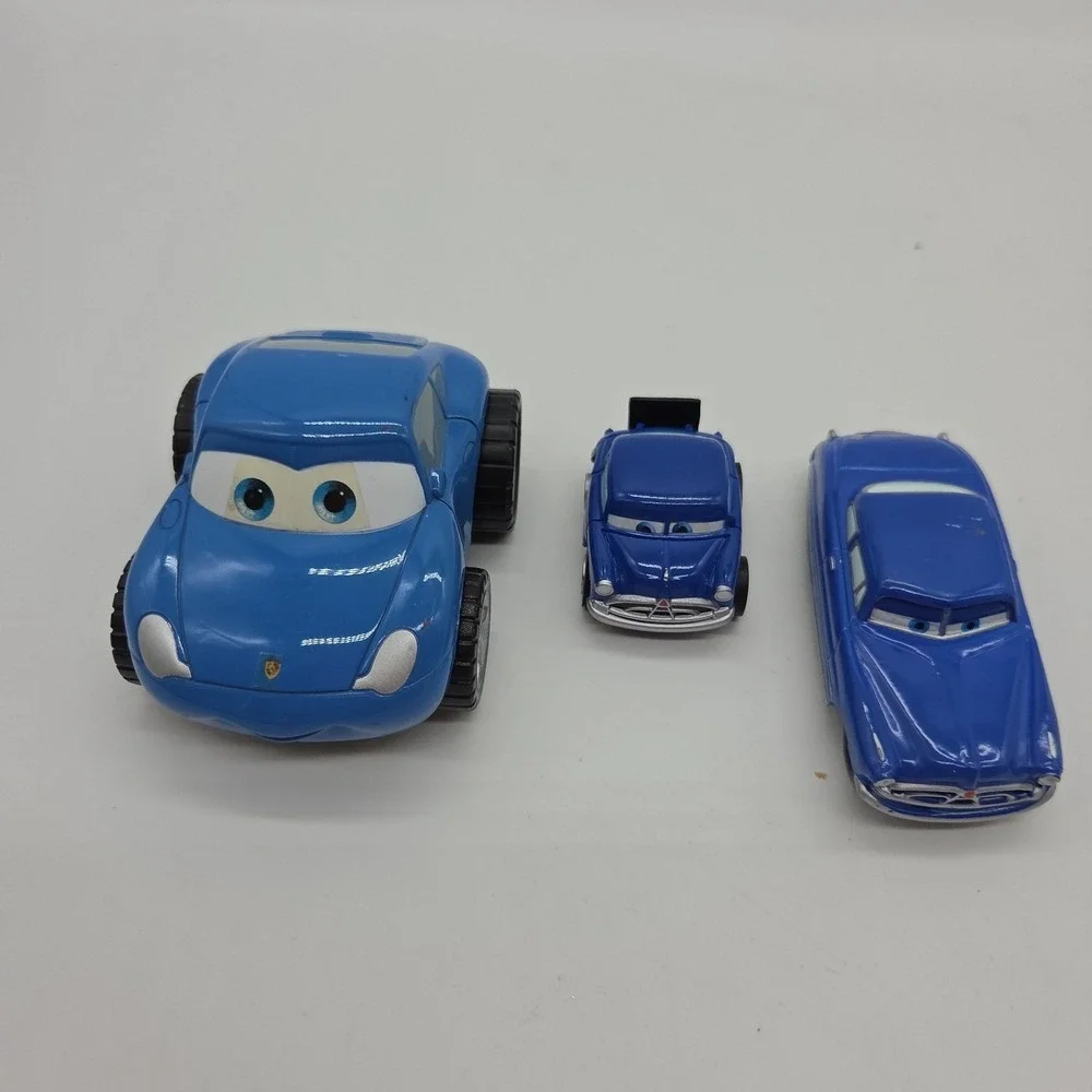 Lot 13 Disney Pixar Cars Toys Mater Hudson Chick Hicks Luigi Piston Trophy